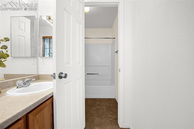 8753 Bamboo Grv, Colorado Springs, CO 80951 - full bathroom featuring vanity, tile patterned flooring, and bathing tub / shower combination