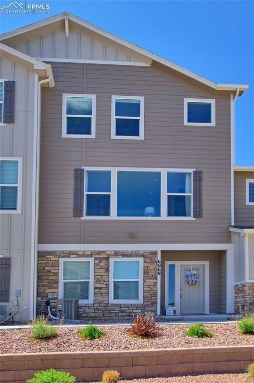 6069 Inman Vw, Colorado Springs, CO 80924 - multi unit property with board and batten siding and stone siding