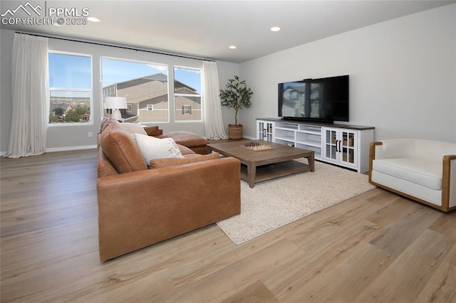 6069 Inman Vw, Colorado Springs, CO 80924 - living room with wood finished floors and recessed lighting