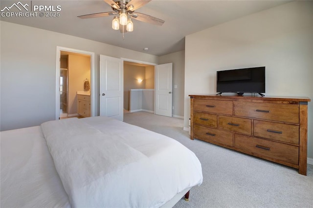 6069 Inman Vw, Colorado Springs, CO 80924 - bedroom with light carpet, ensuite bathroom, and ceiling fan
