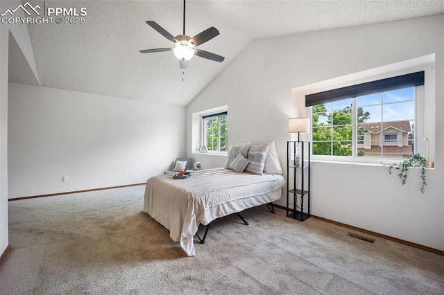 2035 Springcrest Rd, Colorado Springs, CO 80920 - carpeted bedroom with lofted ceiling, ceiling fan, and a textured ceiling