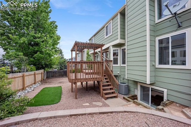 2035 Springcrest Rd, Colorado Springs, CO 80920 - fenced backyard with a wooden deck, a pergola, and stairway
