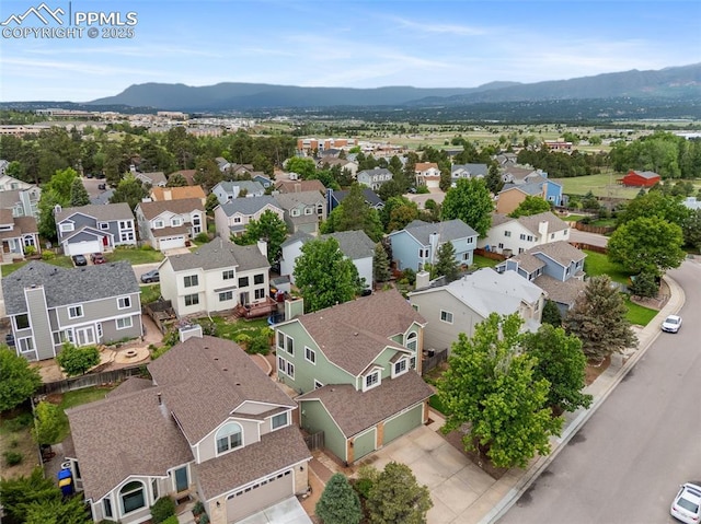 2035 Springcrest Rd, Colorado Springs, CO 80920 - aerial perspective of suburban area with a mountainous background