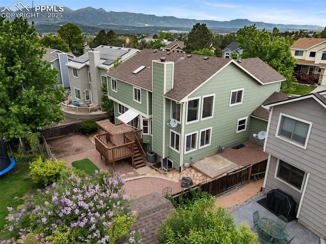 2035 Springcrest Rd, Colorado Springs, CO 80920 - aerial perspective of suburban area with a mountain backdrop