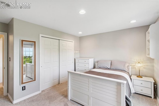 235 Haversham Dr, Colorado Springs, CO 80906 - bedroom with light carpet, a closet, and recessed lighting