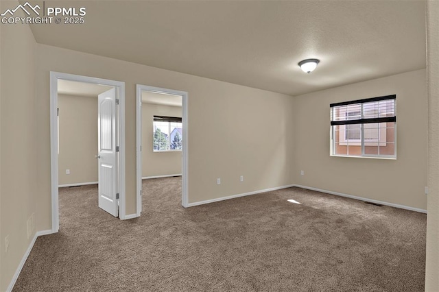 7385 Forest Meadows Ave, Colorado Springs, CO 80908 - empty room featuring carpet floors