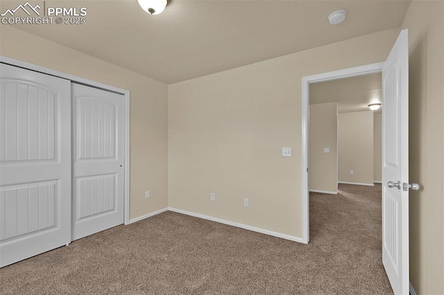 7385 Forest Meadows Ave, Colorado Springs, CO 80908 - unfurnished bedroom featuring carpet and a closet