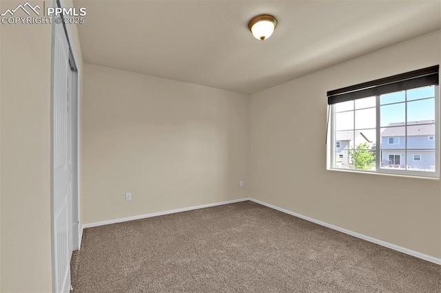 7385 Forest Meadows Ave, Colorado Springs, CO 80908 - spare room with carpet floors and baseboards
