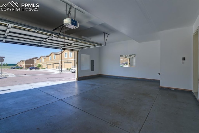 7385 Forest Meadows Ave, Colorado Springs, CO 80908 - garage with a garage door opener and electric panel