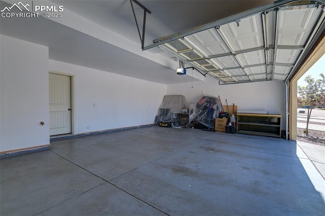 7385 Forest Meadows Ave, Colorado Springs, CO 80908 - garage featuring a garage door opener