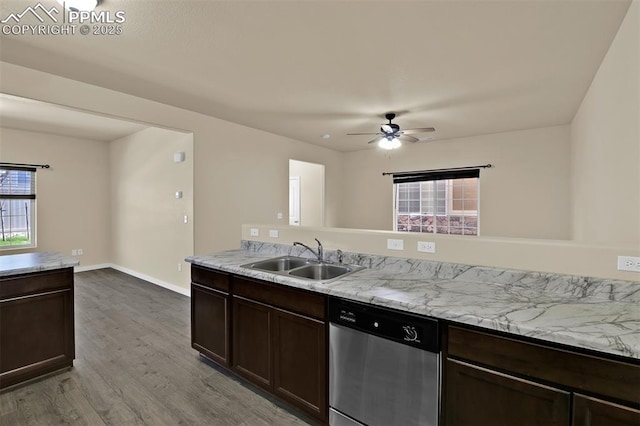 7385 Forest Meadows Ave, Colorado Springs, CO 80908 - kitchen with stainless steel dishwasher, plenty of natural light, wood finished floors, and a ceiling fan