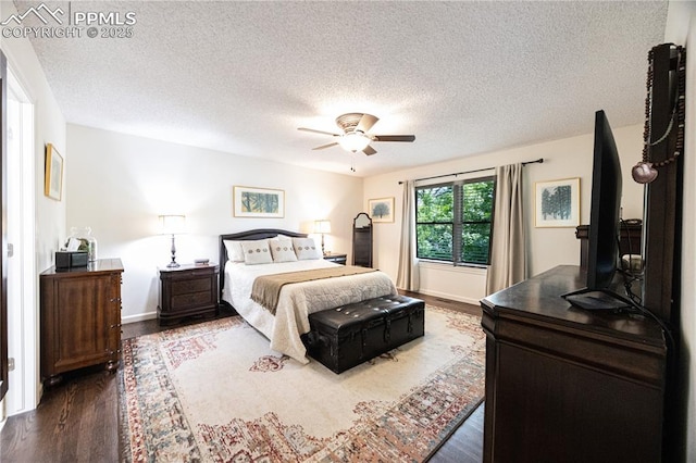 2125 Glenhill Rd, Colorado Springs, CO 80906 - bedroom with wood finished floors, a textured ceiling, and a ceiling fan