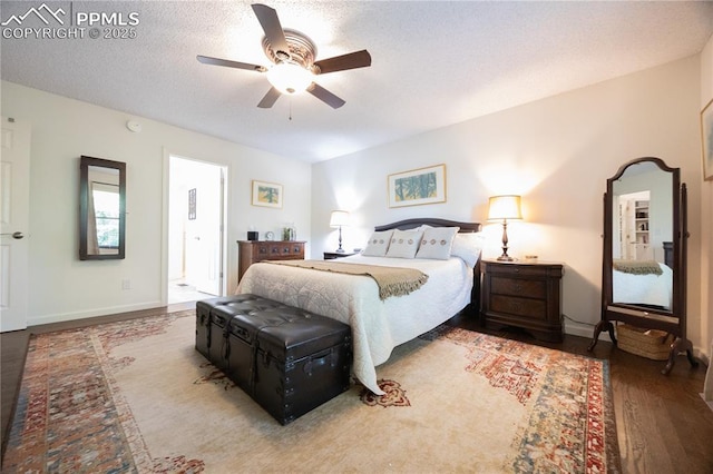 2125 Glenhill Rd, Colorado Springs, CO 80906 - bedroom featuring wood finished floors, a textured ceiling, and a ceiling fan