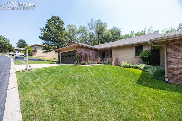 2125 Glenhill Rd, Colorado Springs, CO 80906 - ranch-style house with a garage, a front yard, concrete driveway, and brick siding
