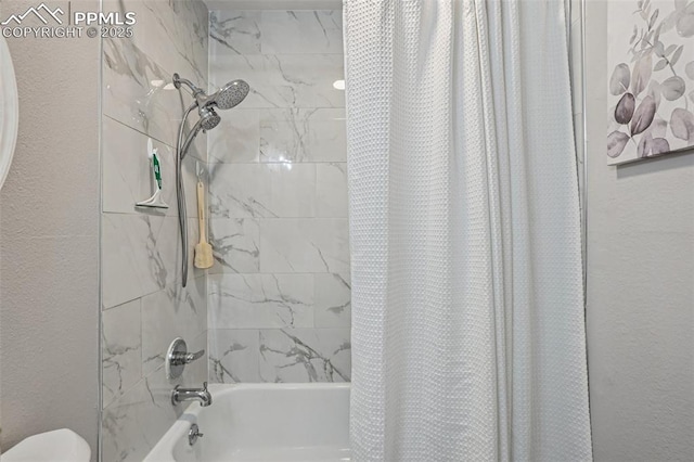 5300 E Cherry Creek Dr Unit 918, Denver, CO 80246 - bathroom featuring shower / tub combo with curtain and toilet