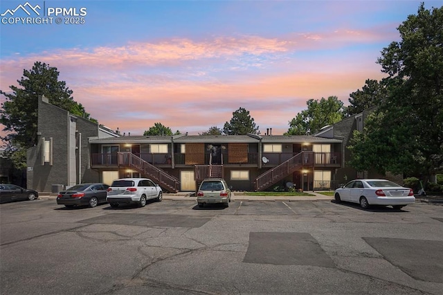 5300 E Cherry Creek Dr Unit 918, Denver, CO 80246 - view of front of property featuring stairs and uncovered parking