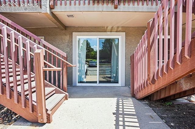 5300 E Cherry Creek Dr Unit 918, Denver, CO 80246 - view of exterior entry featuring stucco siding