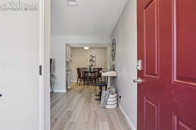 5300 E Cherry Creek Dr Unit 918, Denver, CO 80246 - foyer entrance with light wood-style floors and baseboards