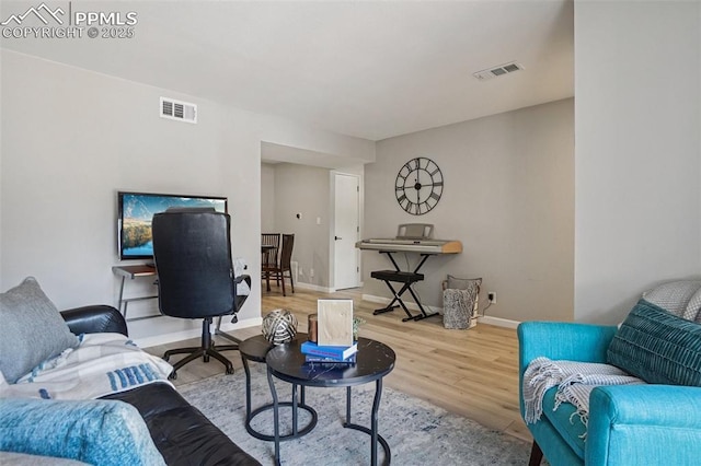 5300 E Cherry Creek Dr Unit 918, Denver, CO 80246 - living room with baseboards and wood finished floors