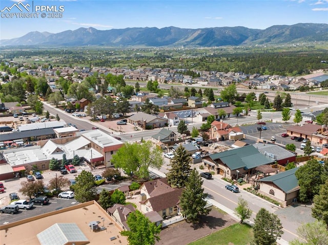 244 Washington St, Monument, CO 80132 - aerial view of residential area with a mountainous background