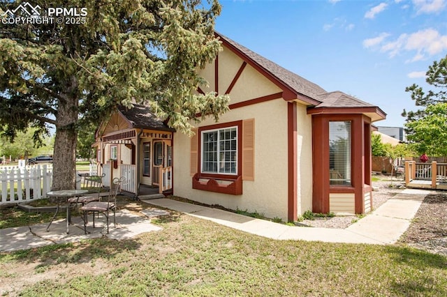 244 Washington St, Monument, CO 80132 - view of property exterior with stucco siding and a shingled roof