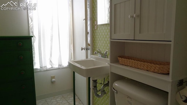 372 Crystal Dr, Cripple Creek, CO 80813 - bathroom with baseboards and toilet