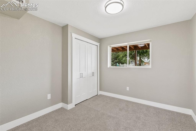 1880 Southmoor Dr, Fountain, CO 80817 - unfurnished bedroom with carpet and a closet