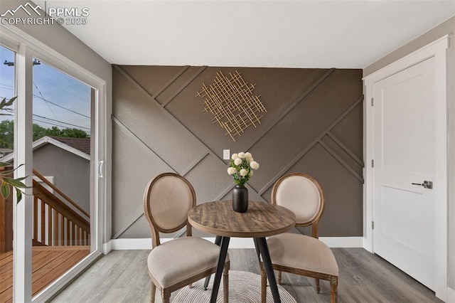 1880 Southmoor Dr, Fountain, CO 80817 - dining room featuring wood finished floors