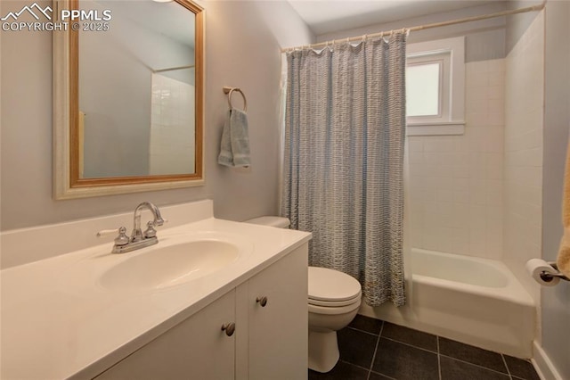 1018 Saturn Dr, Colorado Springs, CO 80905 - bathroom featuring vanity, tile patterned flooring, and shower / bath combo with shower curtain