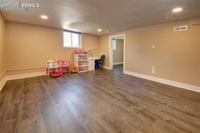 1018 Saturn Dr, Colorado Springs, CO 80905 - game room with wood finished floors and recessed lighting