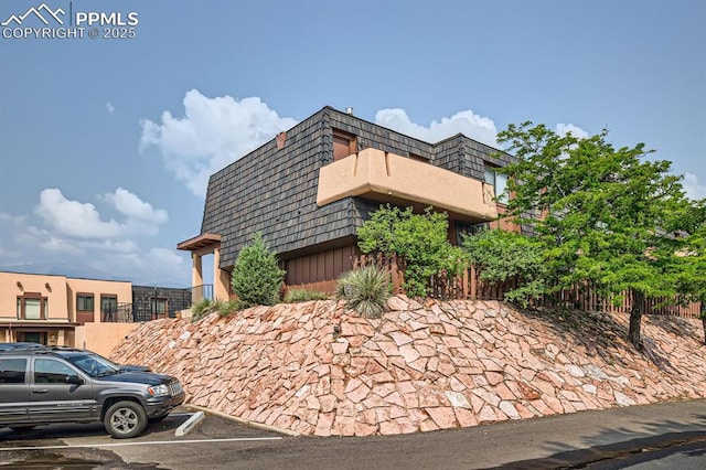 2913 Mesa Rd Unit A, Colorado Springs, CO 80904 - view of property featuring uncovered parking