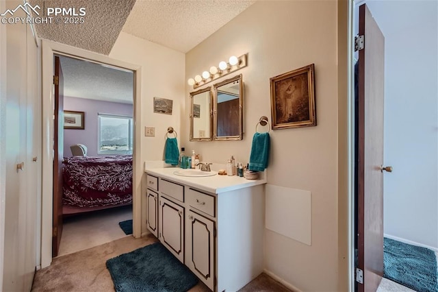 2913 Mesa Rd Unit A, Colorado Springs, CO 80904 - ensuite bathroom with a textured ceiling and vanity