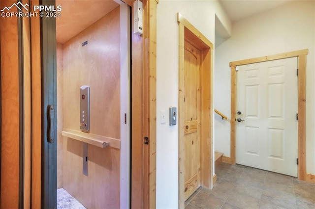 71 Crestone Cir, Florissant, CO 80816 - corridor featuring elevator