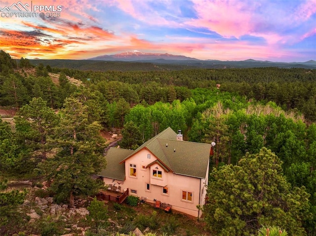 71 Crestone Cir, Florissant, CO 80816 - aerial view at dusk of a view of trees and a mountain view