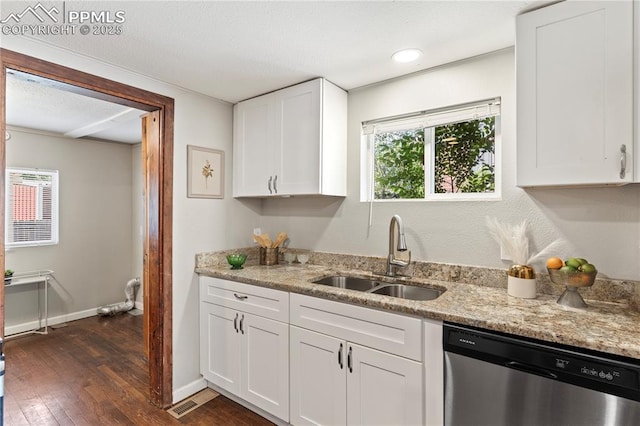121 Via, San Miguel, Manitou Springs, CO 80829 - kitchen with dishwasher, white cabinetry, light stone counters, and dark wood-style floors