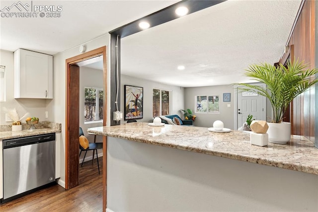 121 Via, San Miguel, Manitou Springs, CO 80829 - kitchen featuring dishwasher, wood finished floors, white cabinets, light stone counters, and recessed lighting