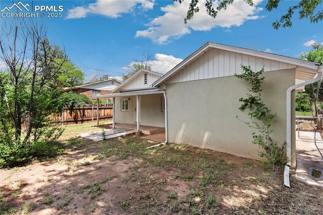 121 Via, San Miguel, Manitou Springs, CO 80829 - rear view of property with stucco siding