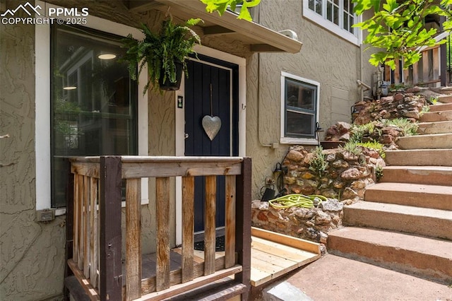 33 Minnehaha Ave, Manitou Springs, CO 80829 - doorway to property with stucco siding