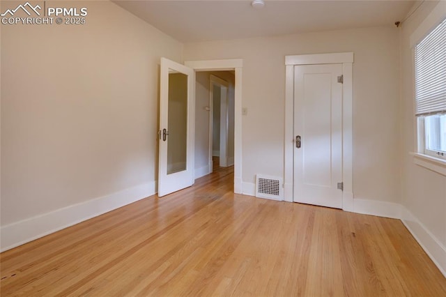 620 E Fontanero St, Colorado Springs, CO 80907 - unfurnished bedroom with light wood finished floors and a closet
