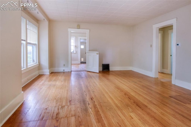 620 E Fontanero St, Colorado Springs, CO 80907 - empty room featuring plenty of natural light and light wood-type flooring