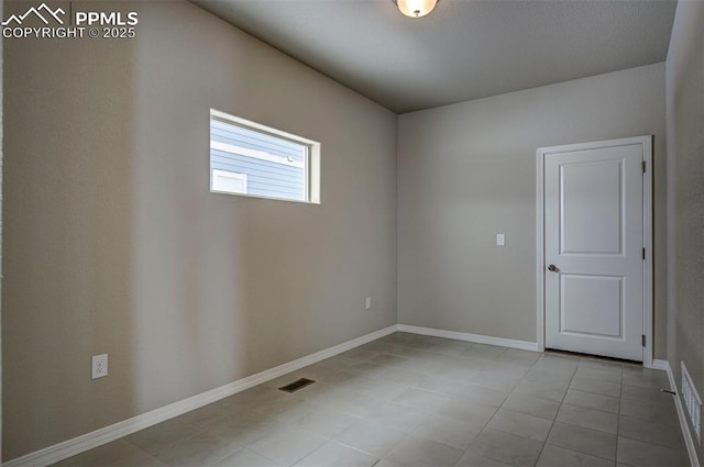 8235 Kittrick Pl, Falcon, CO 80831 - empty room featuring baseboards and light tile patterned floors