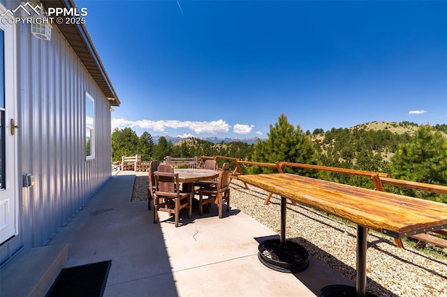 333 Della Fox Ln, Westcliffe, CO 81252 - view of patio / terrace with outdoor dining space and a mountain view