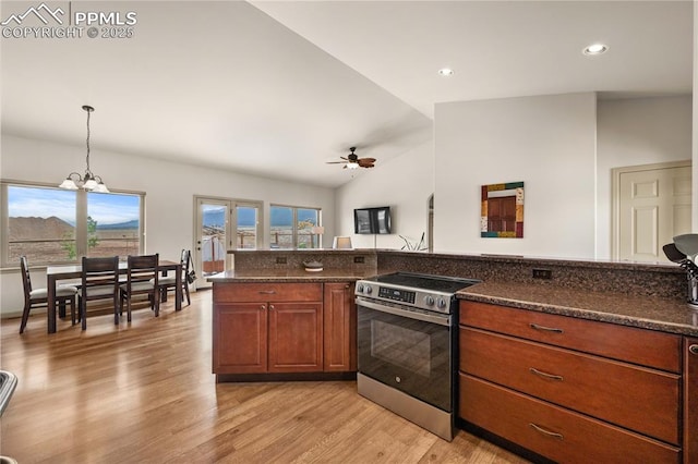 106 Red Tail Blvd, Buena Vista, CO 81211 - kitchen featuring electric stove, a ceiling fan, light wood-style flooring, a chandelier, and brown cabinetry