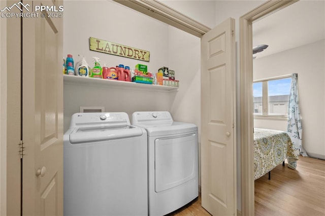 106 Red Tail Blvd, Buena Vista, CO 81211 - laundry area with washing machine and dryer and light wood-style flooring