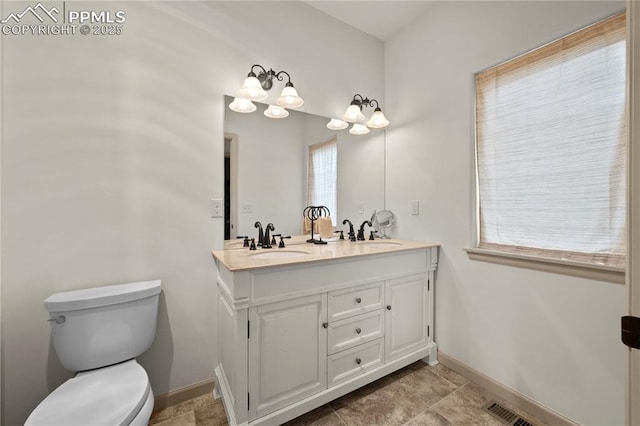 106 Red Tail Blvd, Buena Vista, CO 81211 - full bathroom featuring double vanity and toilet