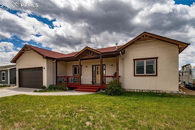 106 Red Tail Blvd, Buena Vista, CO 81211 - single story home featuring stucco siding, covered porch, an attached garage, and concrete driveway