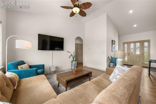 106 Red Tail Blvd, Buena Vista, CO 81211 - living room featuring a ceiling fan, arched walkways, wood finished floors, recessed lighting, and high vaulted ceiling