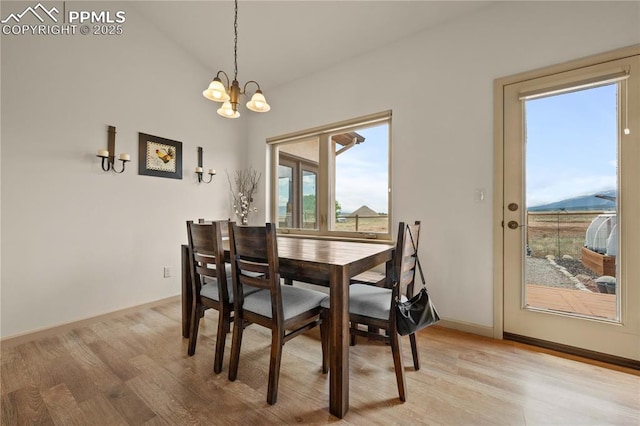 106 Red Tail Blvd, Buena Vista, CO 81211 - dining area with a chandelier and light wood-style flooring