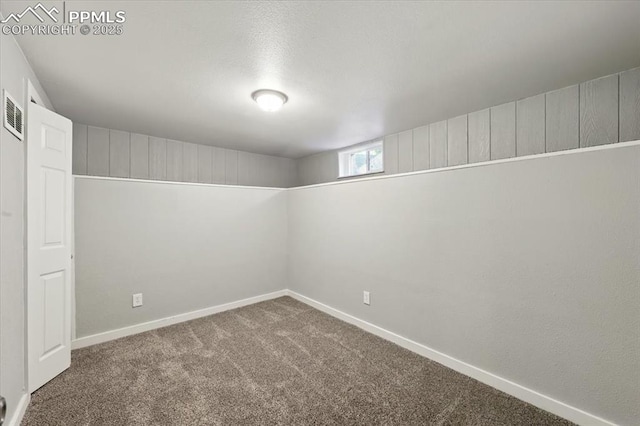 1137 Pando Ave, Colorado Springs, CO 80905 - below grade area featuring carpet floors and baseboards