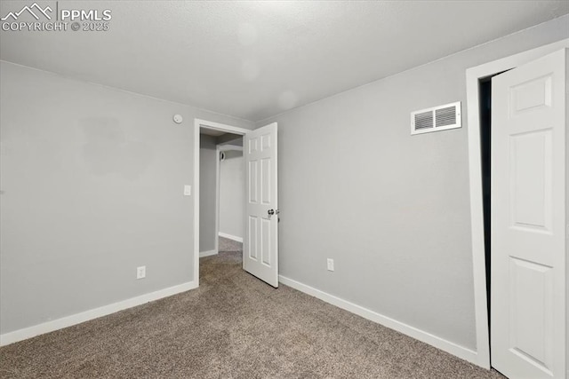 1137 Pando Ave, Colorado Springs, CO 80905 - unfurnished bedroom with carpet flooring and baseboards
